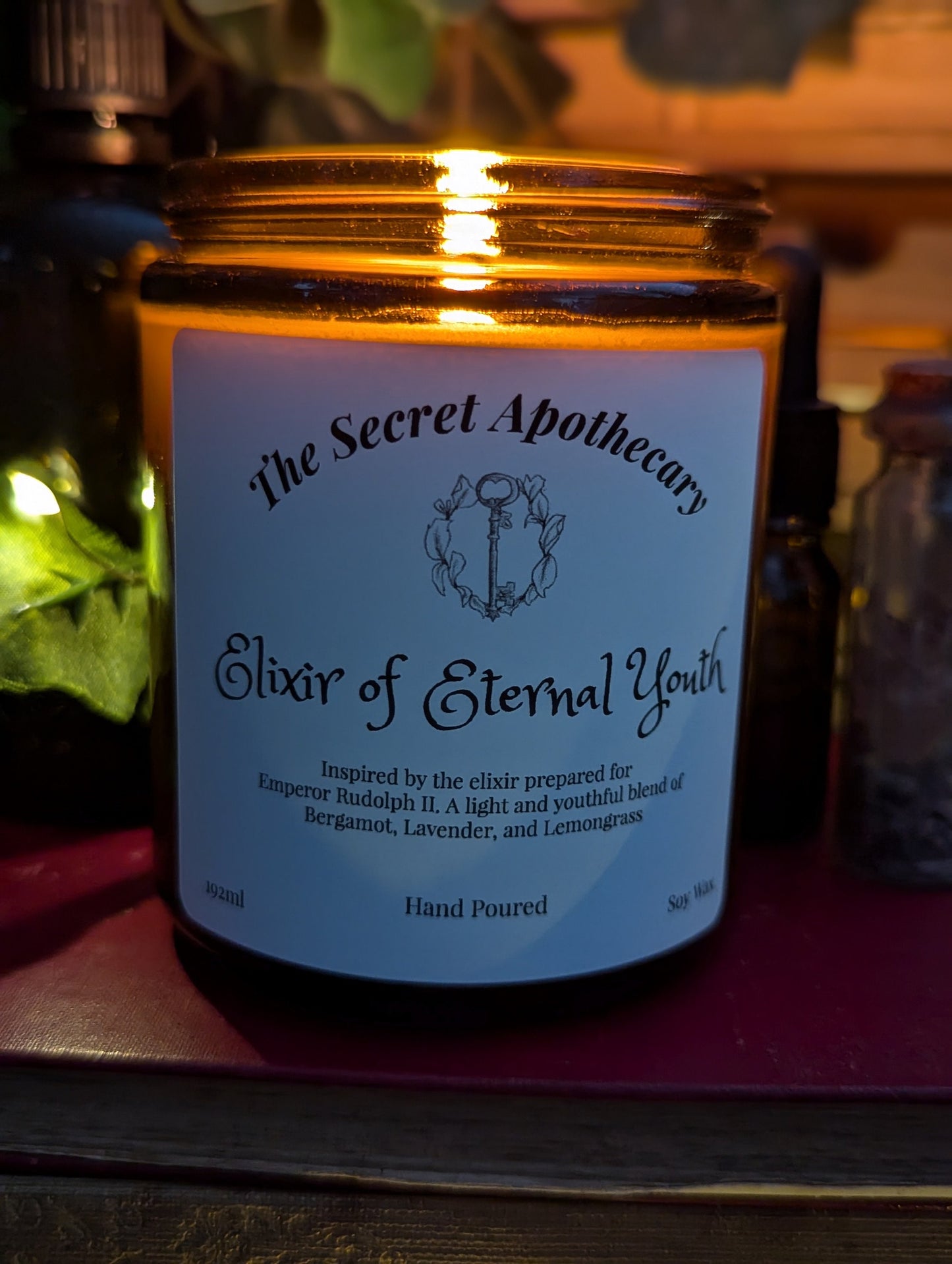 Elixir of Eternal Youth - Luxury Scented Candle. Alchemist Range. 100% organic soy wax candle with premium essential oils in amber glass jar