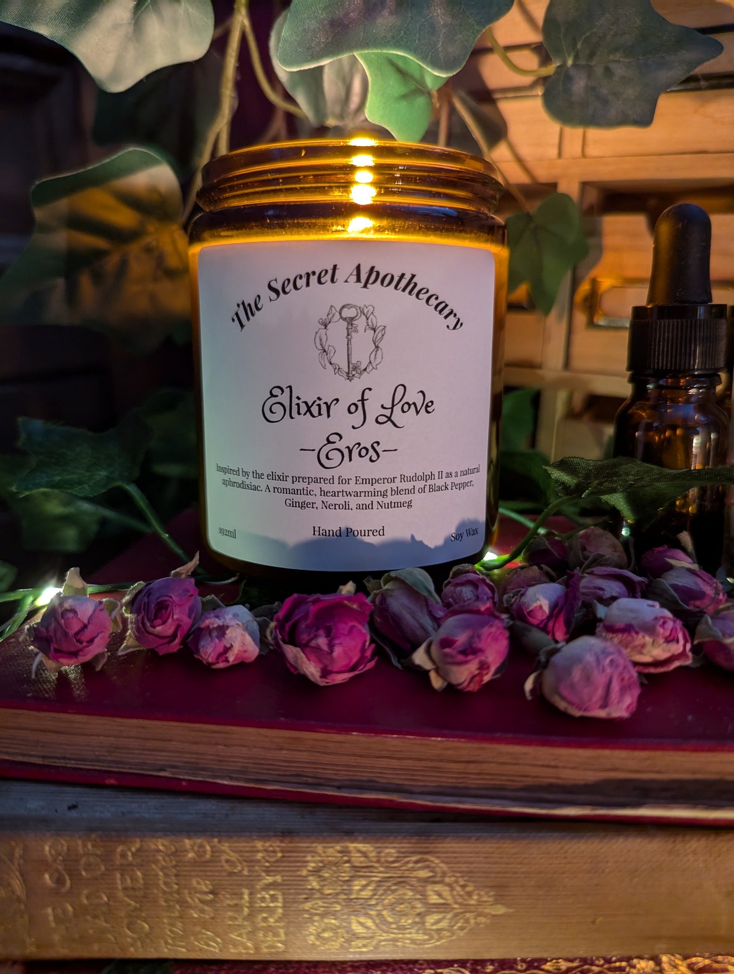 Elixir of Love - Eros - Luxury Scented Candle. Alchemist Range. 100% organic soy wax candle with premium essential oils in amber glass jar.