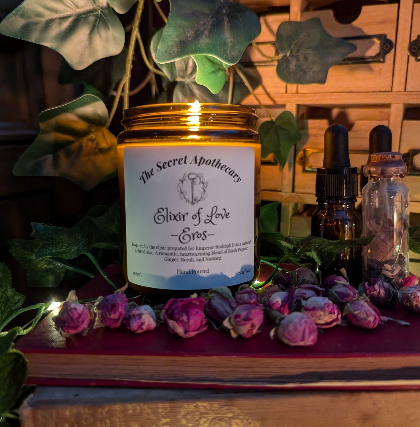 Elixir of Love - Eros - Luxury Scented Candle. Alchemist Range. 100% organic soy wax candle with premium essential oils in amber glass jar.