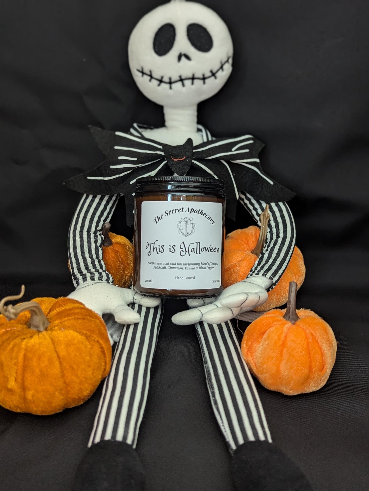 This is Halloween Luxury Scented Candle - 100% organic soy wax with premium essential oils in amber glass jar. Nightmare Before Christmas.