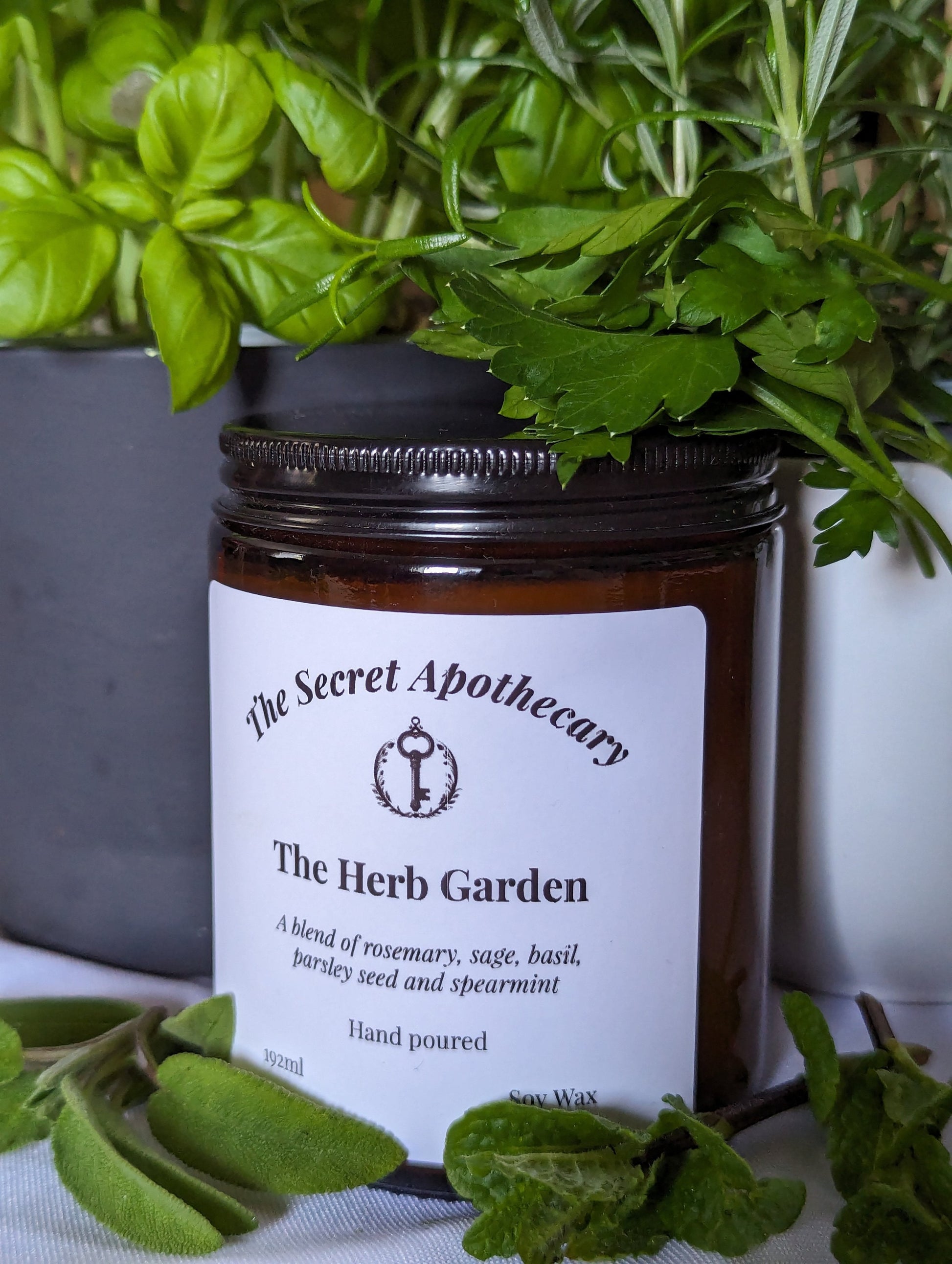 The Herb Garden Luxury Scented Candle - 100% organic soy wax candle with premium essential oils in amber glass jar. Eco friendly.
