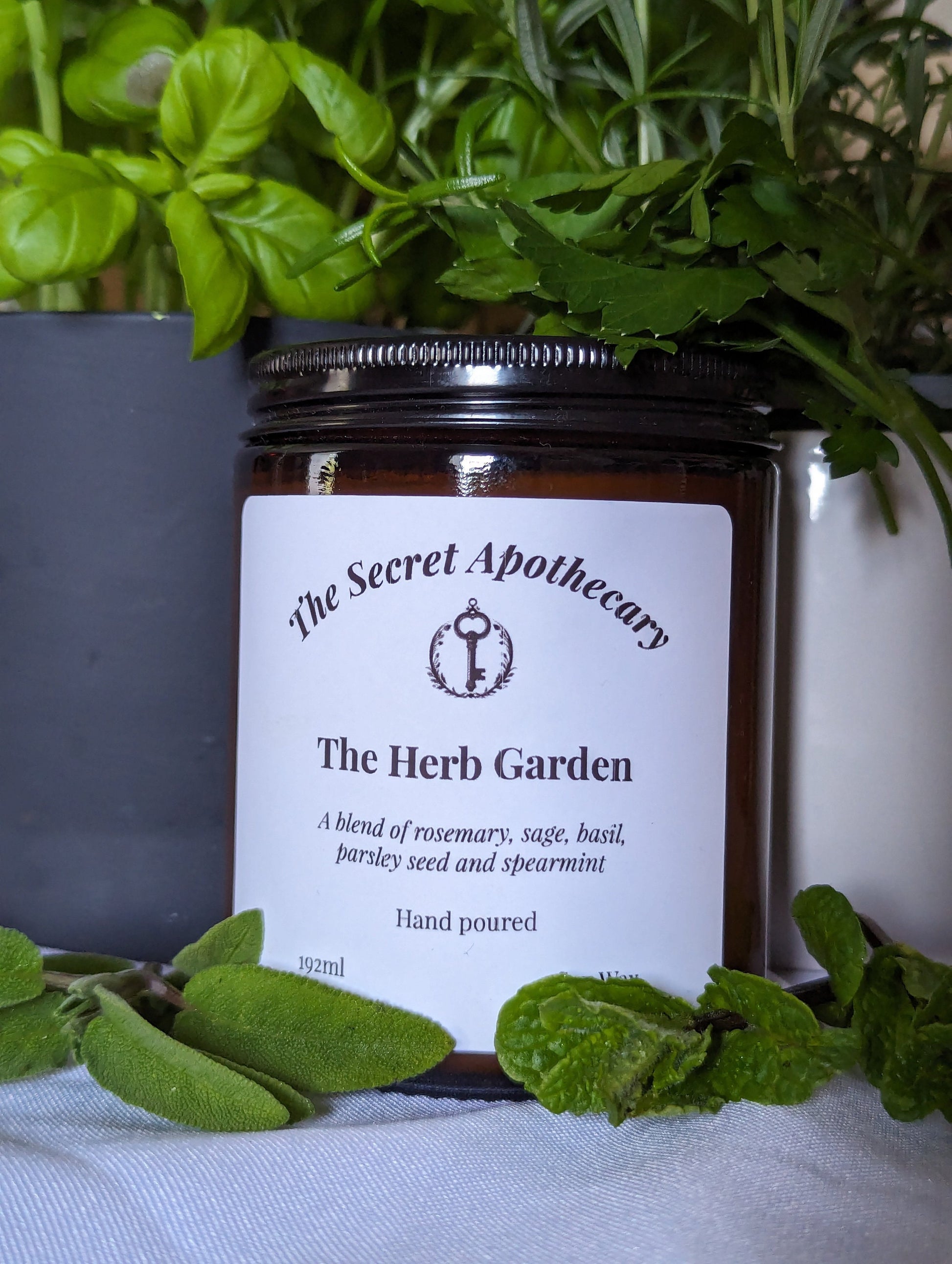 The Herb Garden Luxury Scented Candle - 100% organic soy wax candle with premium essential oils in amber glass jar. Eco friendly.