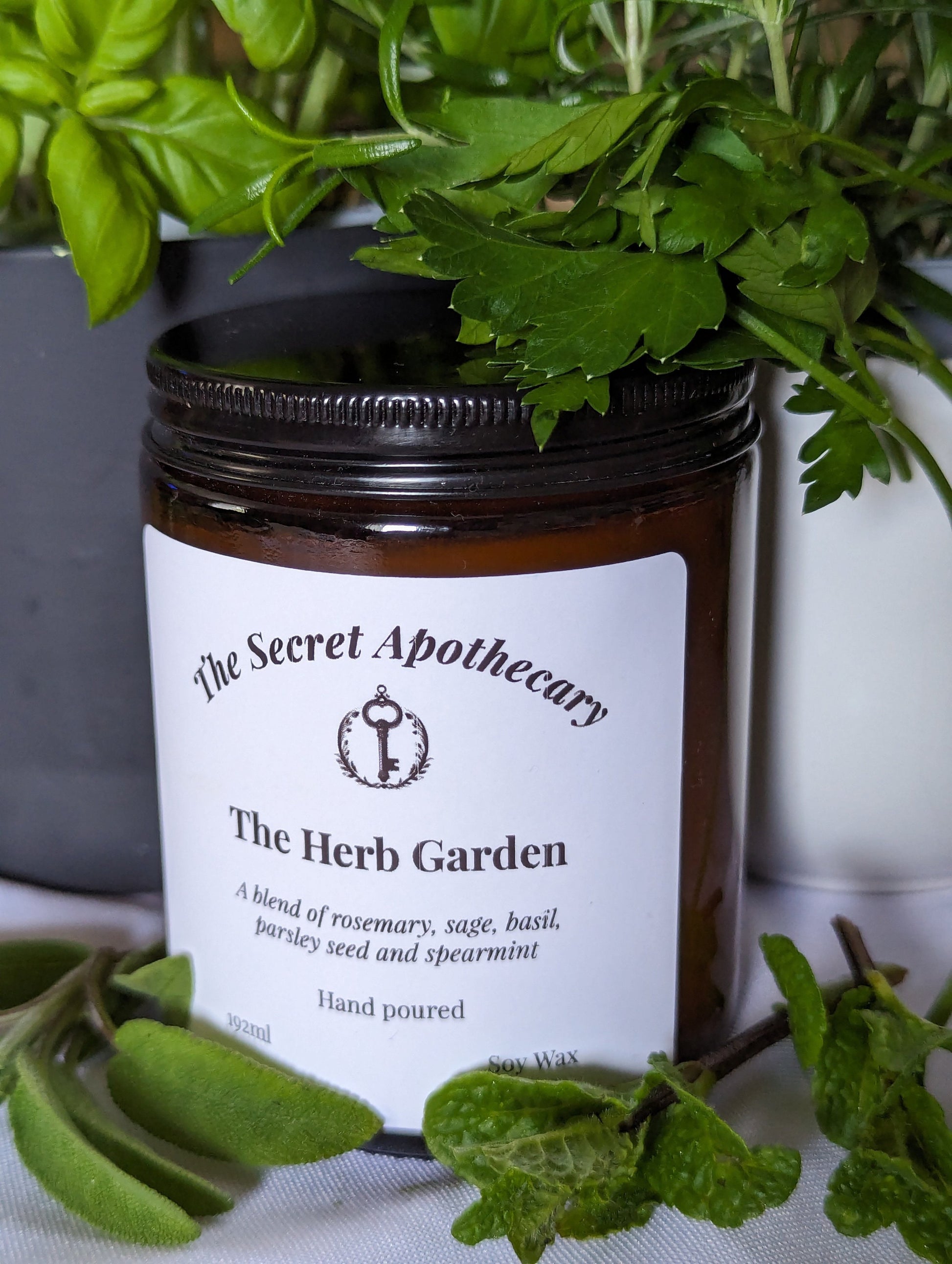 The Herb Garden Luxury Scented Candle - 100% organic soy wax candle with premium essential oils in amber glass jar. Eco friendly.