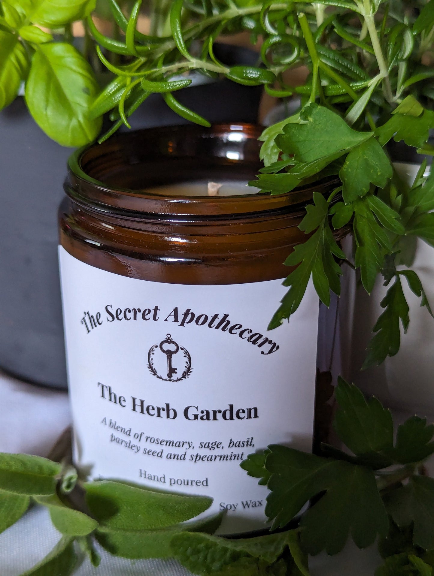 The Herb Garden Luxury Scented Candle - 100% organic soy wax candle with premium essential oils in amber glass jar. Eco friendly.