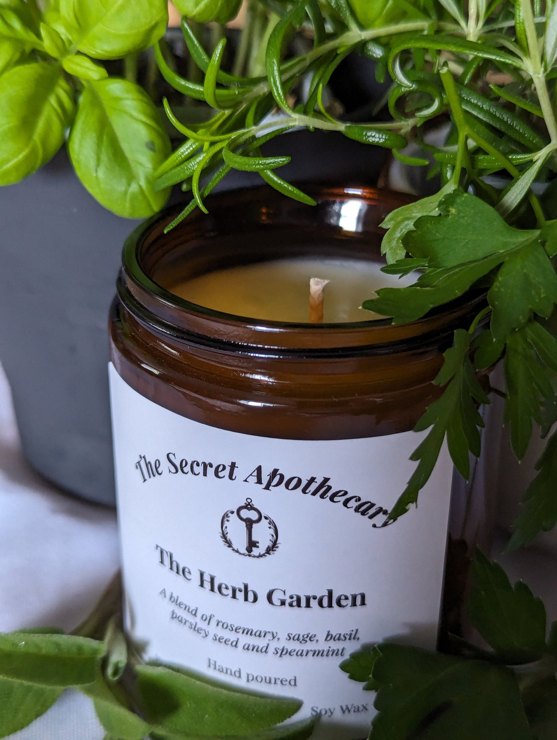 The Herb Garden Luxury Scented Candle - 100% organic soy wax candle with premium essential oils in amber glass jar. Eco friendly.