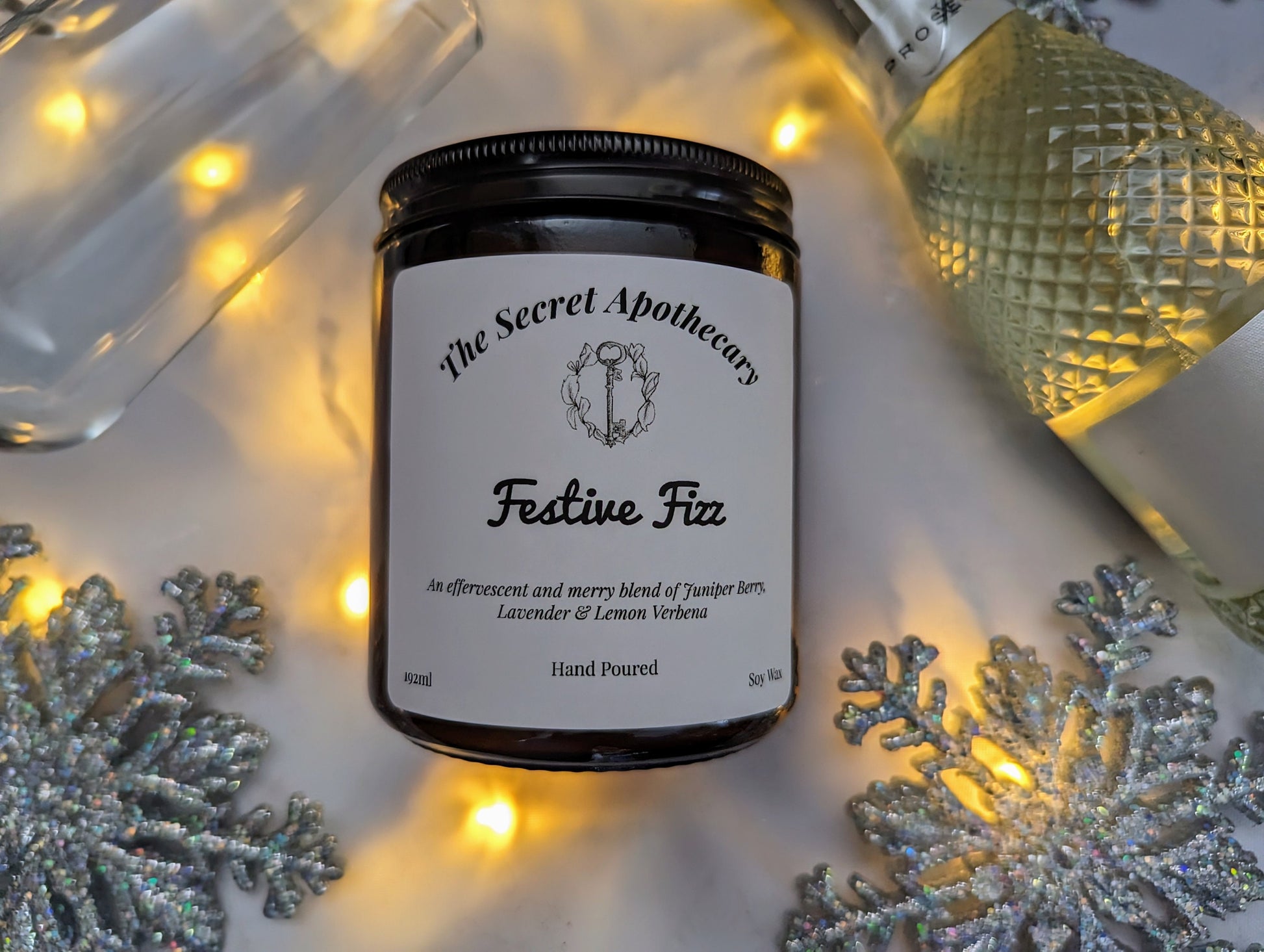 Festive Fizz Luxury Scented Candle - 100% organic soy wax candle with premium essential oils in amber glass jar. Eco friendly.