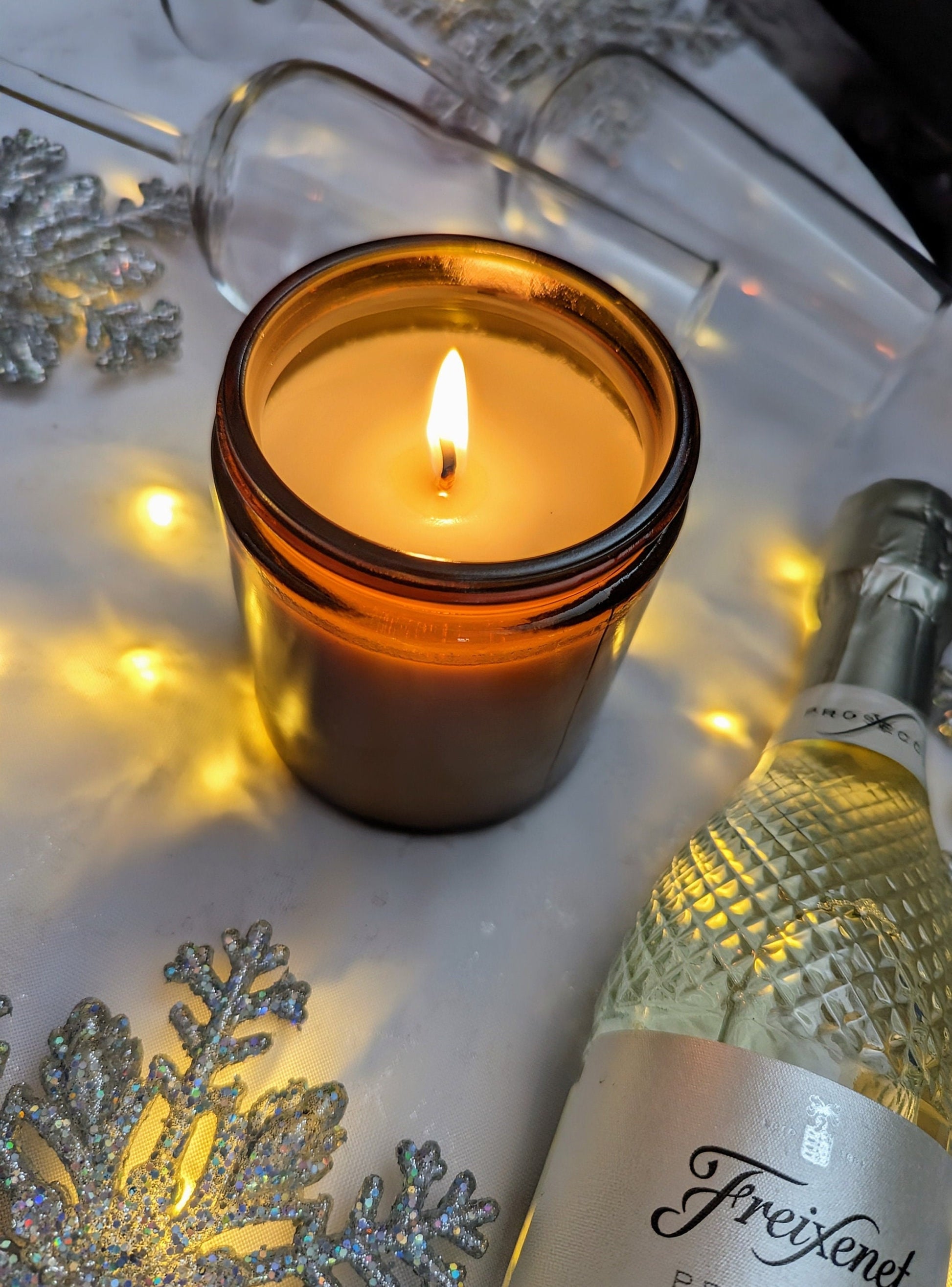 Festive Fizz Luxury Scented Candle - 100% organic soy wax candle with premium essential oils in amber glass jar. Eco friendly.
