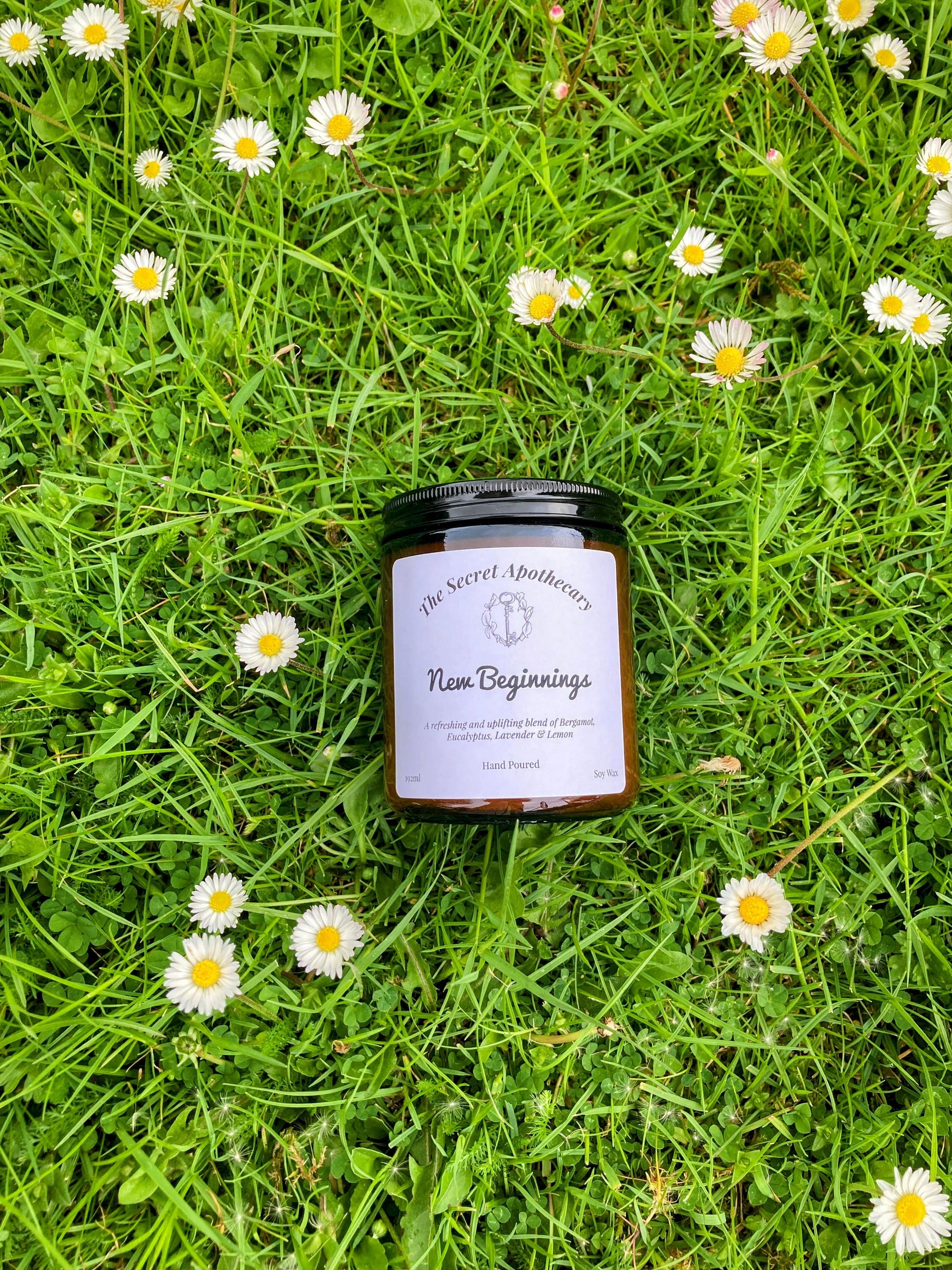 New Beginnings Luxury Scented Candle - 100 % organic soy wax candle with premium essential oils in amber glass jar. Eco friendly.