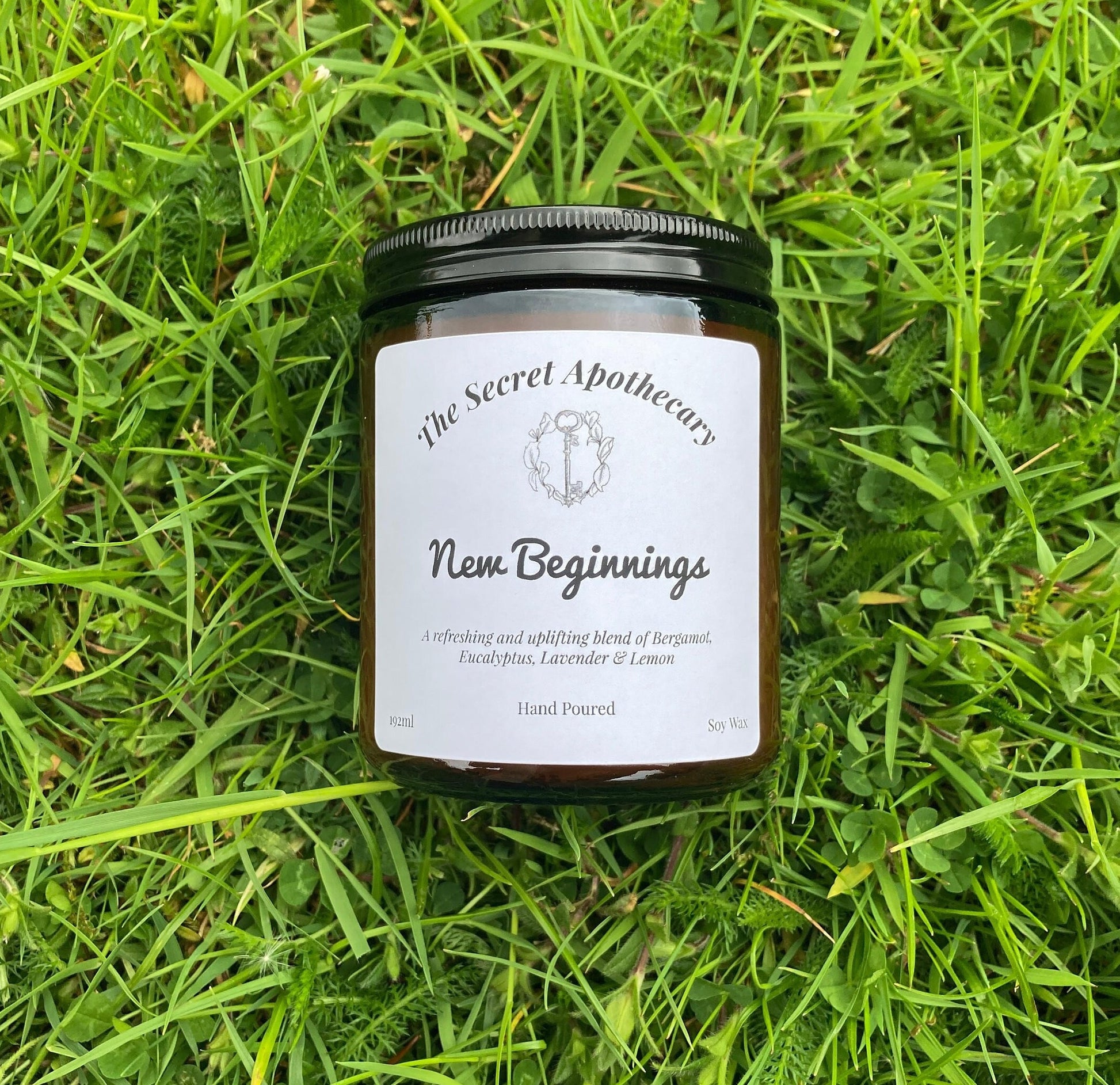 New Beginnings Luxury Scented Candle - 100 % organic soy wax candle with premium essential oils in amber glass jar. Eco friendly.