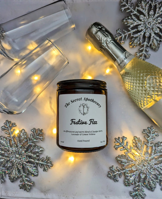 Festive Fizz Luxury Scented Candle - 100% organic soy wax candle with premium essential oils in amber glass jar. Eco friendly.