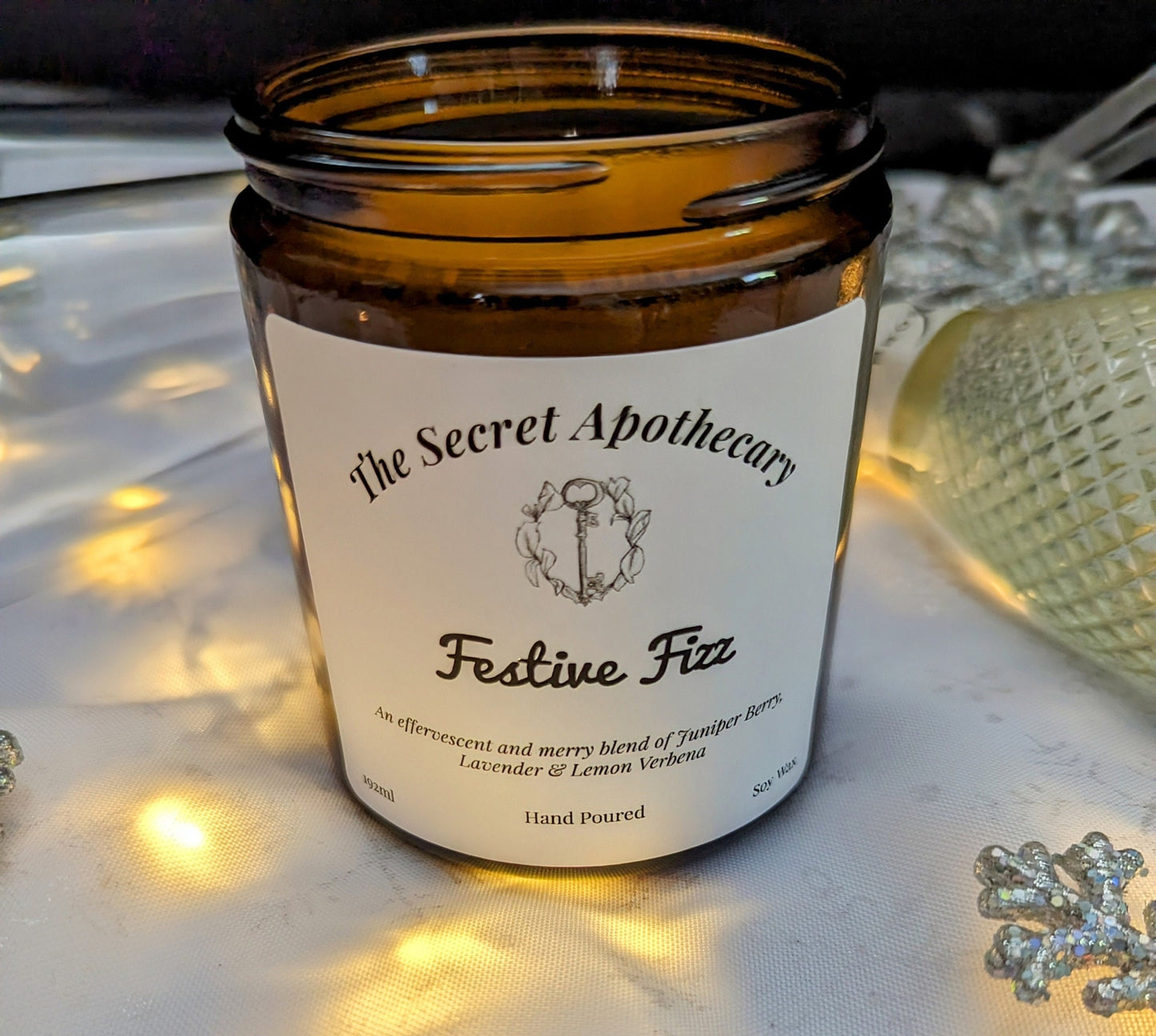 Festive Fizz Luxury Scented Candle - 100% organic soy wax candle with premium essential oils in amber glass jar. Eco friendly.