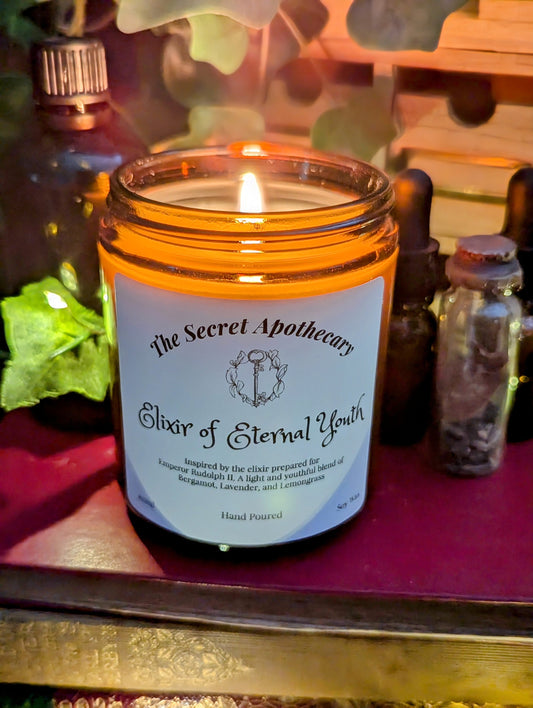 Elixir of Eternal Youth - Luxury Scented Candle. Alchemist Range. 100% organic soy wax candle with premium essential oils in amber glass jar