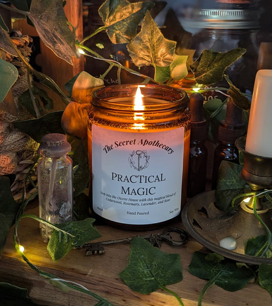 Practical Magic Luxury Scented Candle - 100% organic soy wax with premium essential oils in amber glass jar.