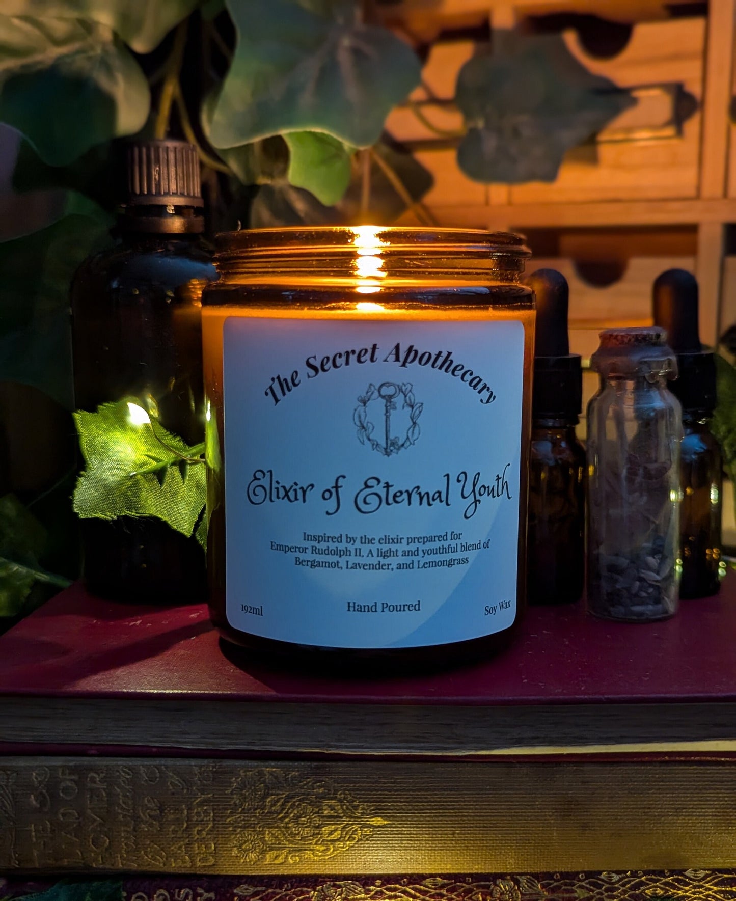 Elixir of Eternal Youth - Luxury Scented Candle. Alchemist Range. 100% organic soy wax candle with premium essential oils in amber glass jar