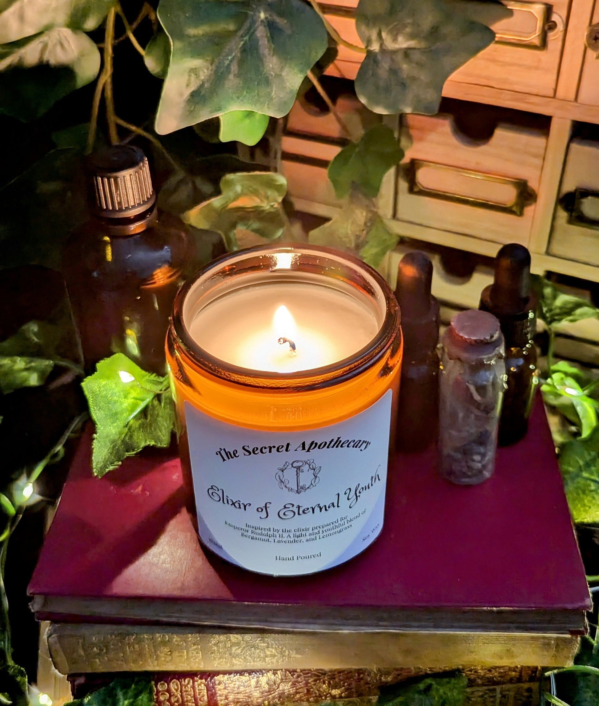 Elixir of Eternal Youth - Luxury Scented Candle. Alchemist Range. 100% organic soy wax candle with premium essential oils in amber glass jar