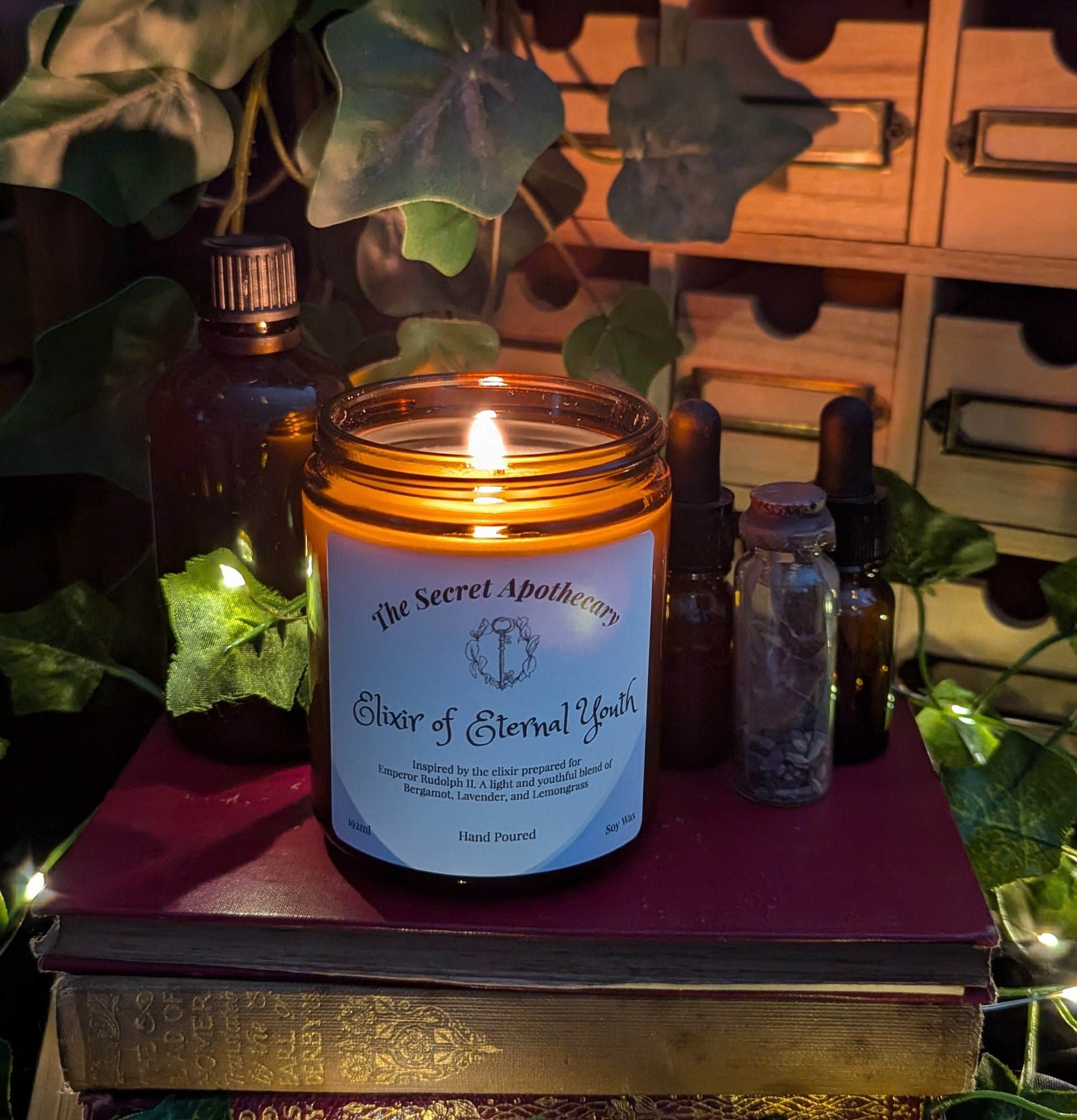 Elixir of Eternal Youth - Luxury Scented Candle. Alchemist Range. 100% organic soy wax candle with premium essential oils in amber glass jar