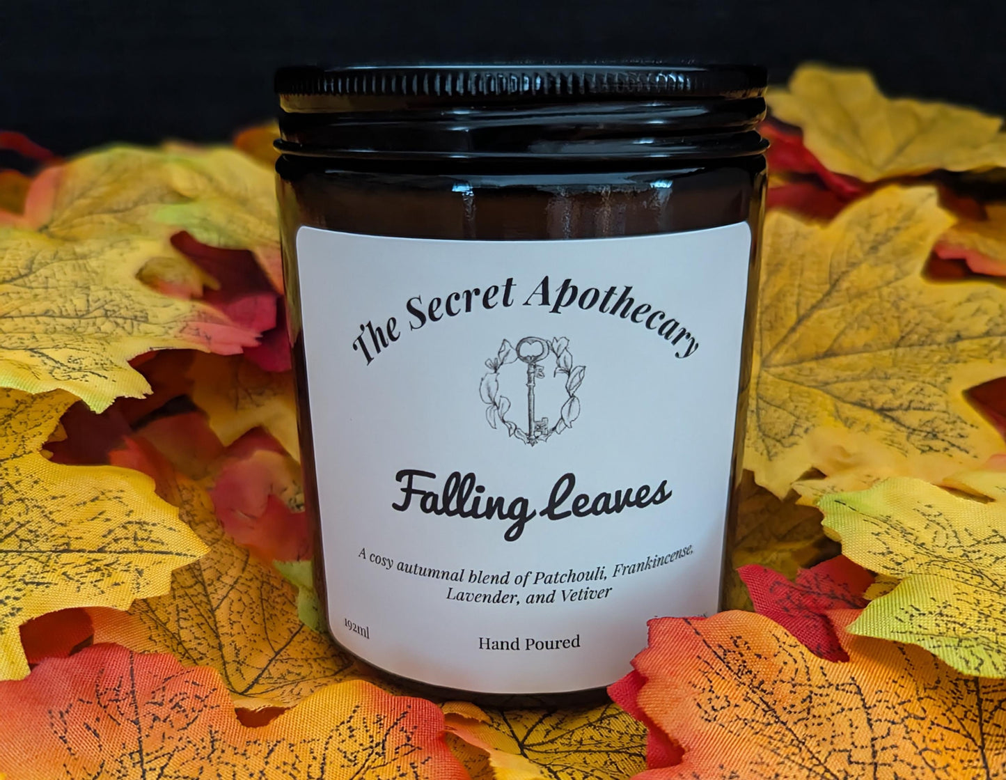 Falling Leaves Luxury Scented Candle - 100% organic soy wax candle with premium essential oils in amber glass jar. Eco friendly.