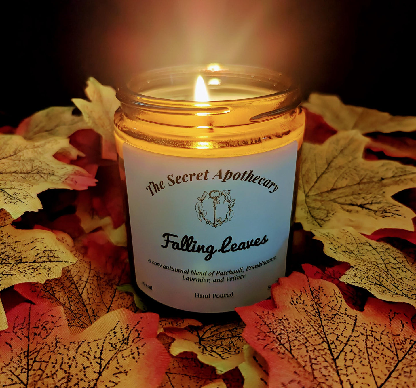 Falling Leaves Luxury Scented Candle - 100% organic soy wax candle with premium essential oils in amber glass jar. Eco friendly.