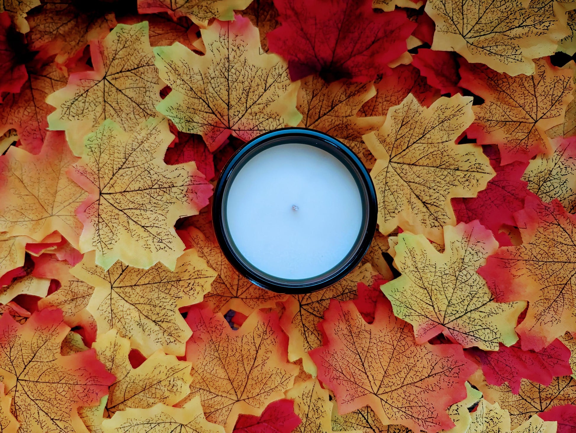 Falling Leaves Luxury Scented Candle - 100% organic soy wax candle with premium essential oils in amber glass jar. Eco friendly.