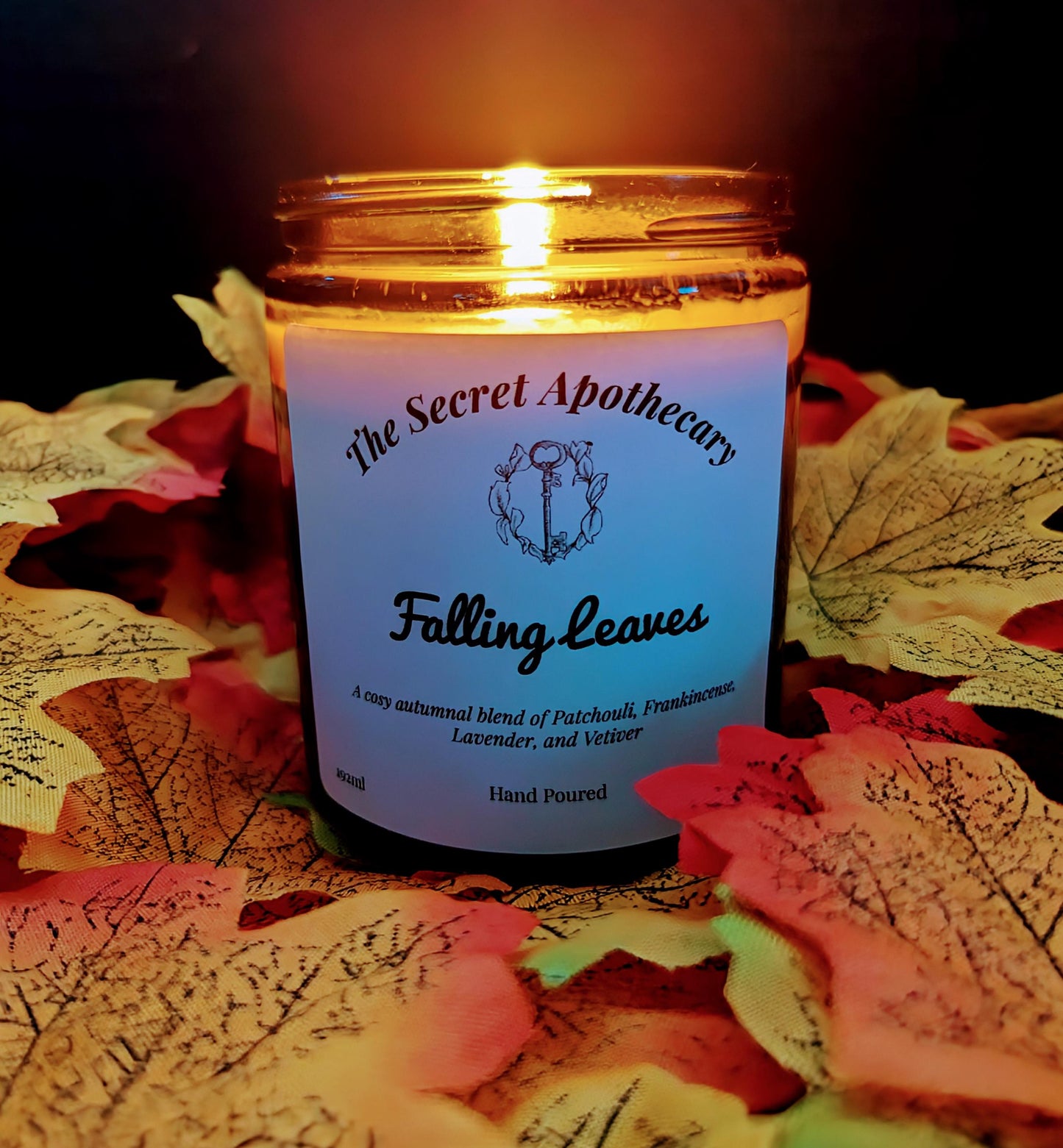 Falling Leaves Luxury Scented Candle - 100% organic soy wax candle with premium essential oils in amber glass jar. Eco friendly.