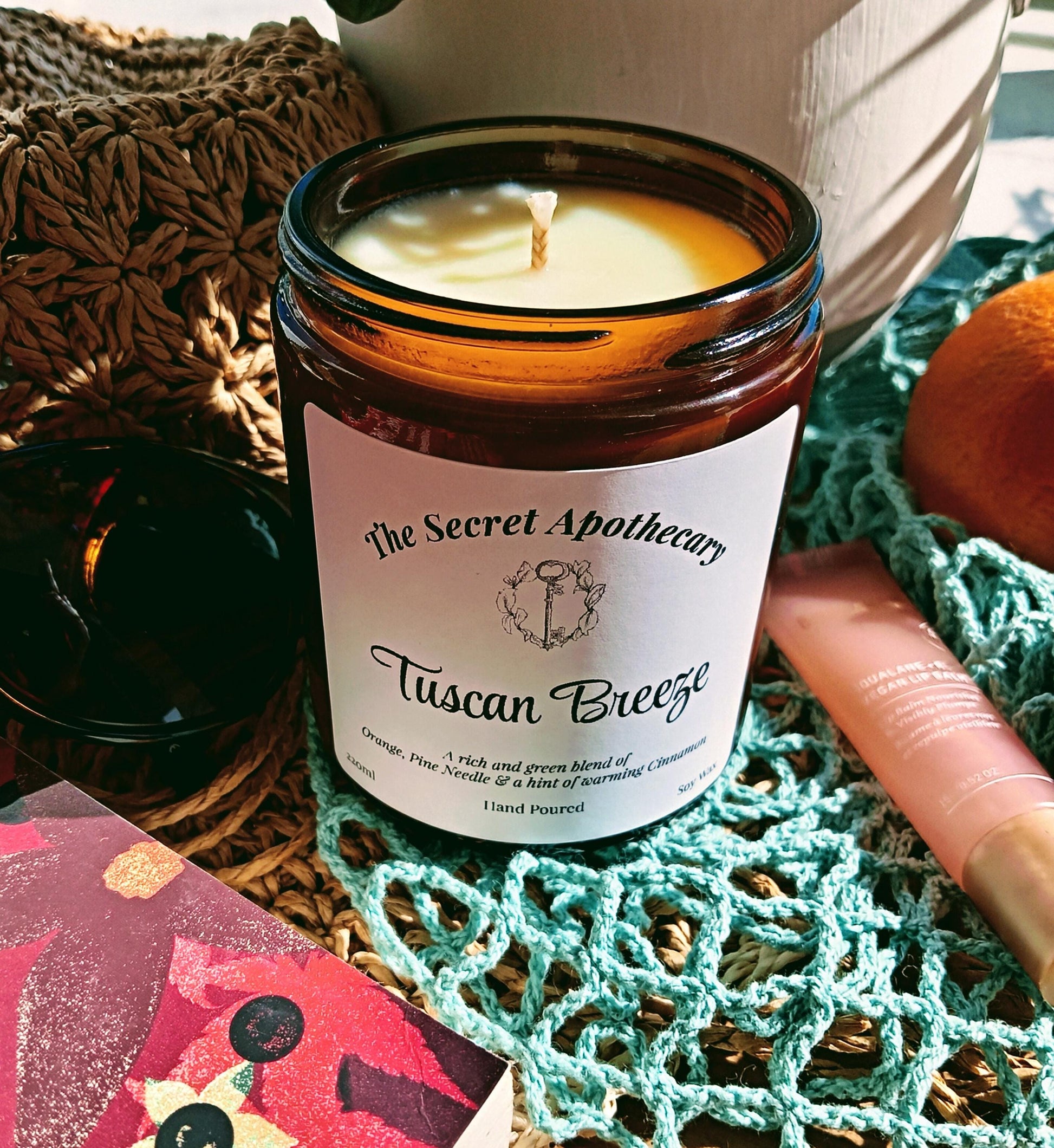 Tuscan Breeze - Luxury Scented Candle. 100% organic soy wax candle with premium essential oils in amber glass jar.